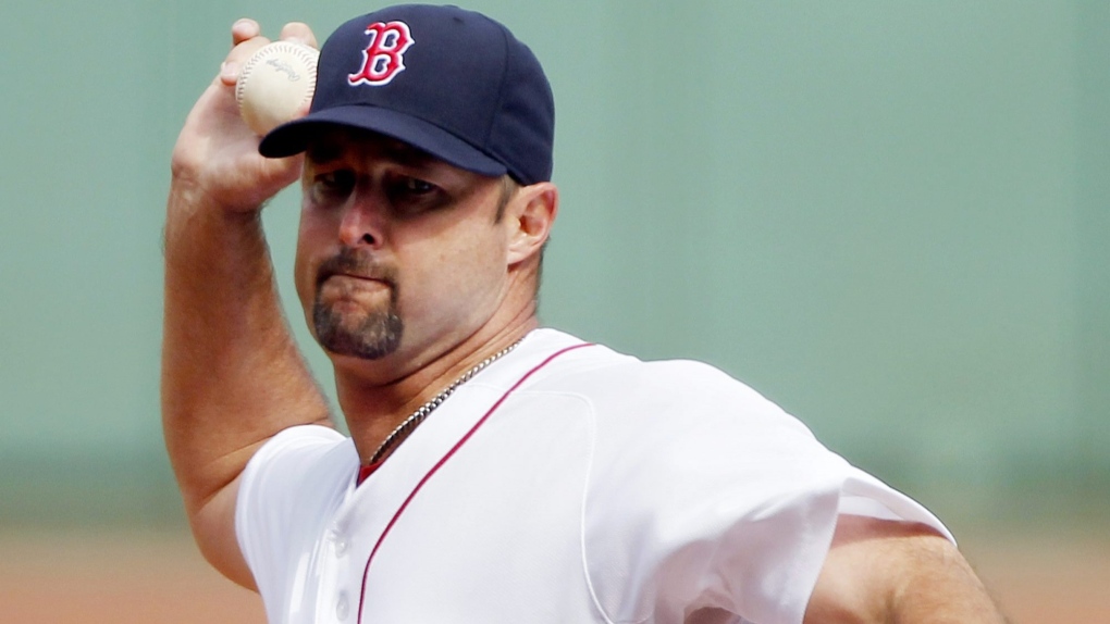 Boston Red Sox's Tim Wakefield pitches in the first inning of a baseball game against the Tampa Bay Rays in Boston, Sunday, Sept. 18, 2011. (AP Photo/Michael Dwyer)
