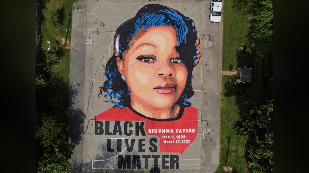 A ground mural depicting a portrait of Breonna Taylor is seen at Chambers Park, Monday, July 6, 2020, in Annapolis, Md.  (AP Photo/Julio Cortez, File)