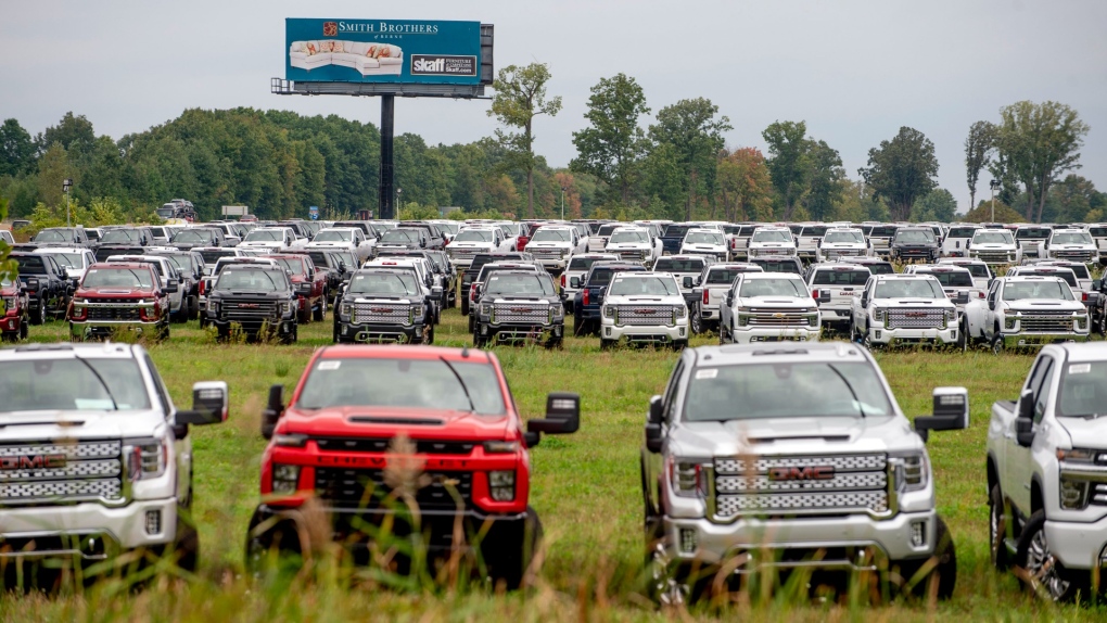 The Chevrolet Silverados and GMC Sierra pickups built at Flint Assembly are packed on Sept. 21, 2021. (Jake May/The Flint Journal via AP)