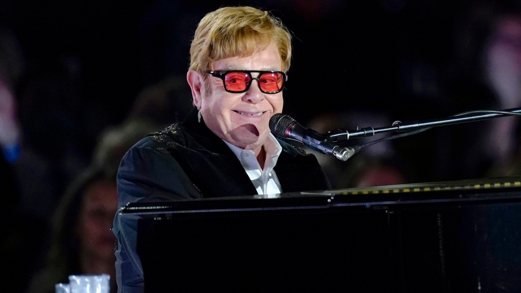 Elton John performs on the South Lawn of the White House in Washington, Friday, Sept. 23, 2022. Elton John is set to address Britain's Parliament on Wednesday, Nov. 29, 2023, on his work fighting HIV at an event to mark World AIDS Day. The British star's AIDS Foundation has led campaigns to extend a pilot government program to test people visiting hospitals' emergency departments for HIV. (AP Photo/Susan Walsh, File)