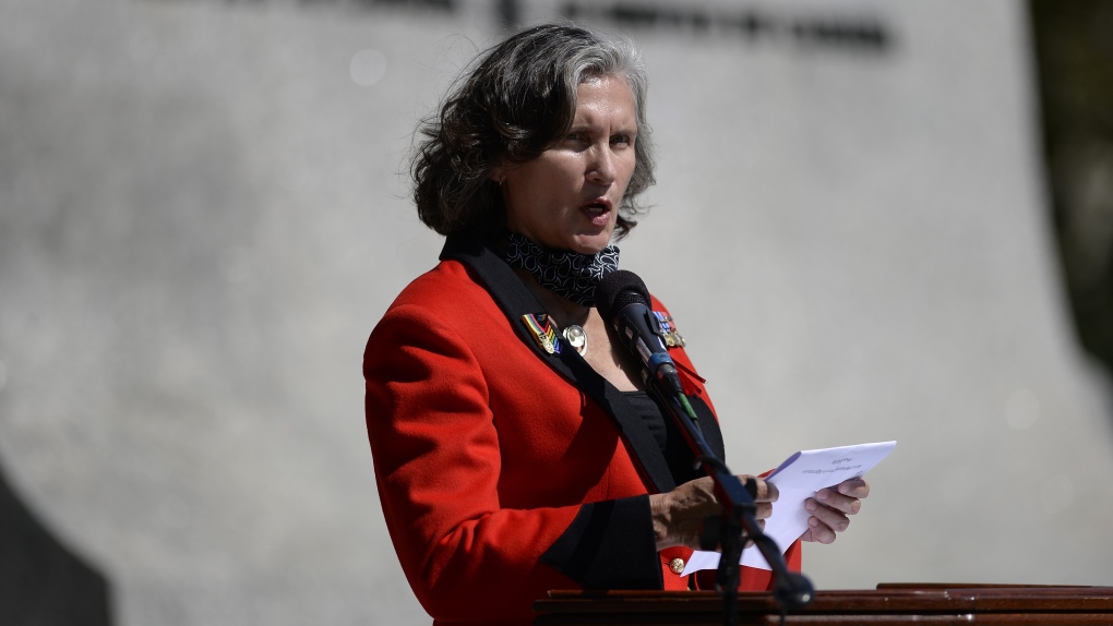 Chief Wendy Jocko reads the act of remembrance during a ceremony marking the 75th anniversary of V-J Day and the end of the Second World War, at the National War Memorial in Ottawa, on Saturday, Aug. 15, 2020. THE CANADIAN PRESS/Justin Tang