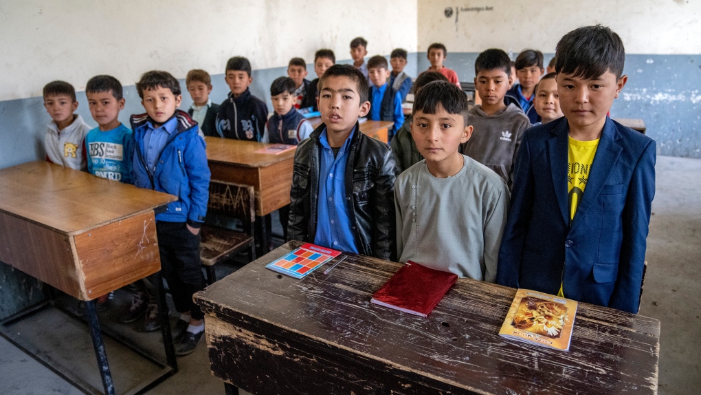 Afghan school boys attend their classroom on the first day of the new school year, in Kabul, Saturday, March 25, 2023. The new Afghan educational year started in Afghanistan, while high school remained closed for girls for the second year after Taliban returned to power in 2021. (AP Photo/Ebrahim Noroozi)