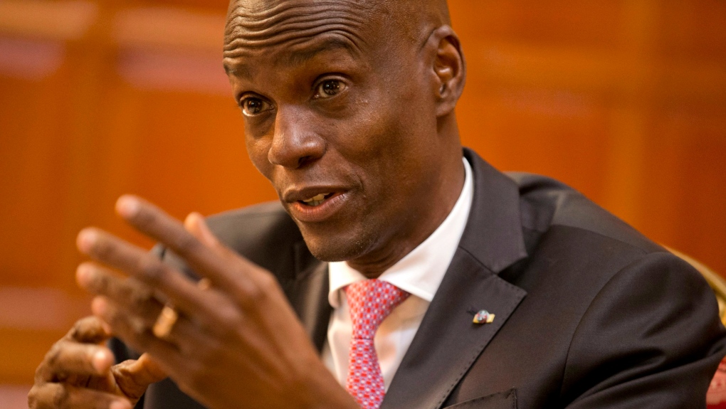 Haiti's President Jovenel Moise speaks during an interview at his home in Petion-Ville, a suburb of Port-au-Prince, Haiti, Friday, Feb. 7, 2020. (AP Photo/Dieu Nalio Chery)