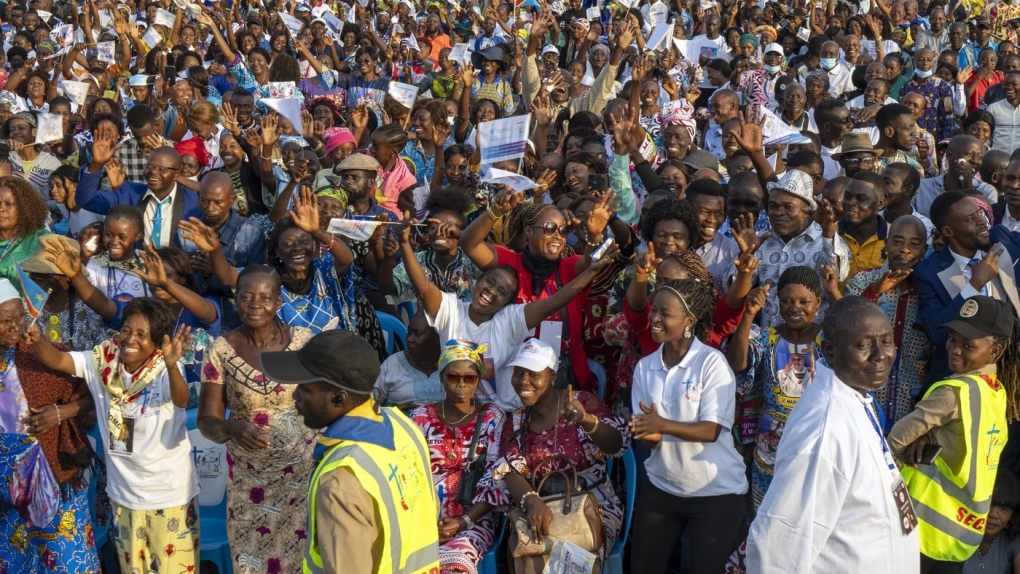 Worshippers gather at Ndolo airport for a Holy Mass with Pope Francis in Kinshasa, Congo, Wednesday, Feb. 1, 2023. (AP Photo/Jerome Delay)