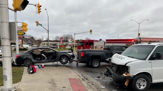 Two-vehicle collision sends four people to hospital