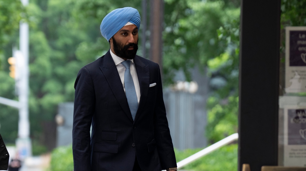 Former Liberal member of parliament Raj Grewal makes his way to court, Monday, July 18, 2022 in Ottawa. THE CANADIAN PRESS/Adrian Wyld