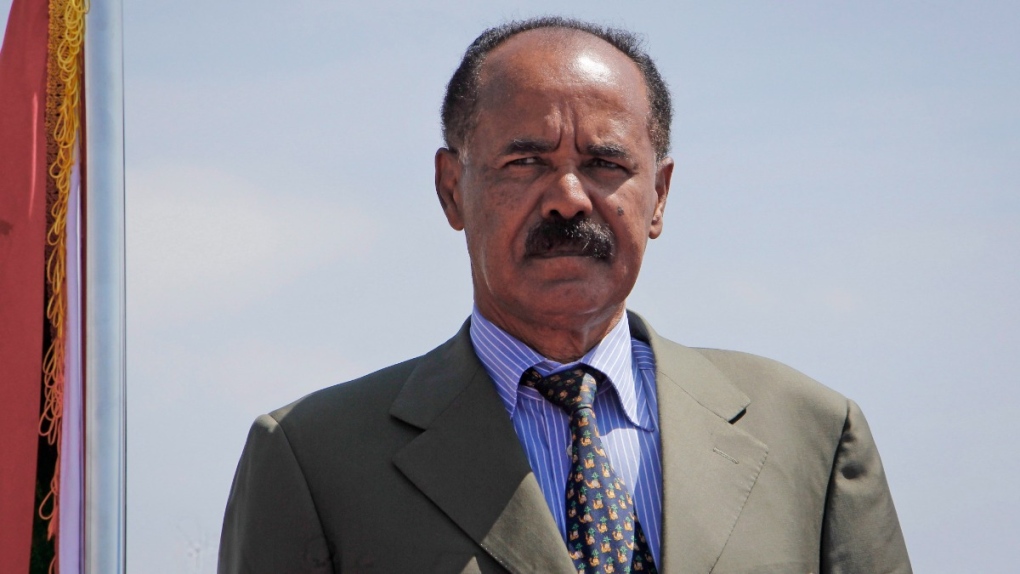 Eritrea's President Isaias Afwerki stands for a military parade at the airport in Mogadishu, Somalia, on Dec. 13, 2018. (Farah Abdi Warsameh / AP) 