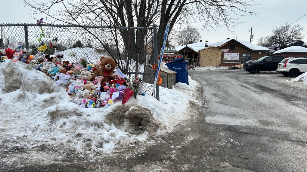 White flags, stuffed animals mark deadly bus crash site at Laval daycare, premier to visit