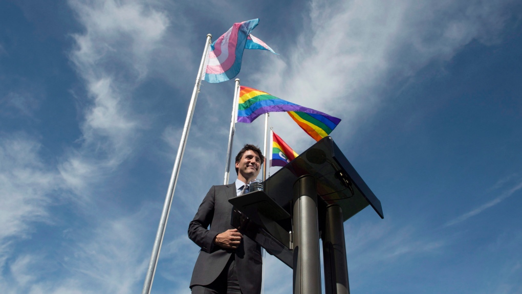 Canadian Prime Minister Justin Trudeau delivers remarks after participating in a ceremony raising the pride and transgender flags on Parliament Hill in Ottawa, Wednesday June 14, 2017. THE CANADIAN PRESS/Adrian Wyld