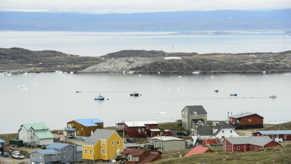 Boats make their way through the Frobisher Bay inlet in Iqaluit on Aug. 2, 2019. THE CANADIAN PRESS/Sean Kilpatrick