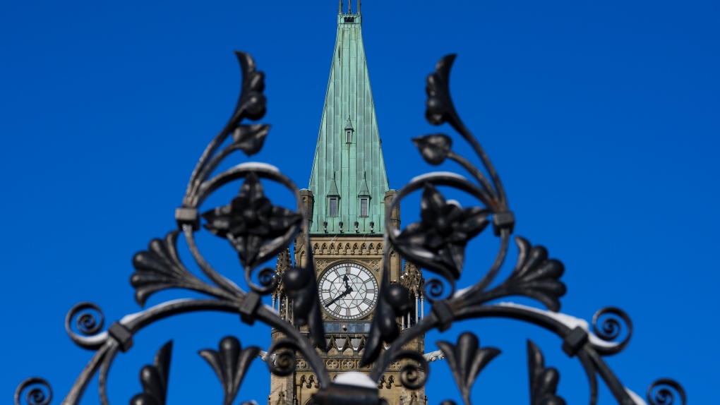 As the federal government drafts its spring budget, fiscal experts say it should consider stricter spending rules and higher taxes to improve federal finances. The Peace Tower is pictured on Parliament Hill in Ottawa on Tuesday, Jan. 31, 2023. THE CANADIAN PRESS/Sean Kilpatrick