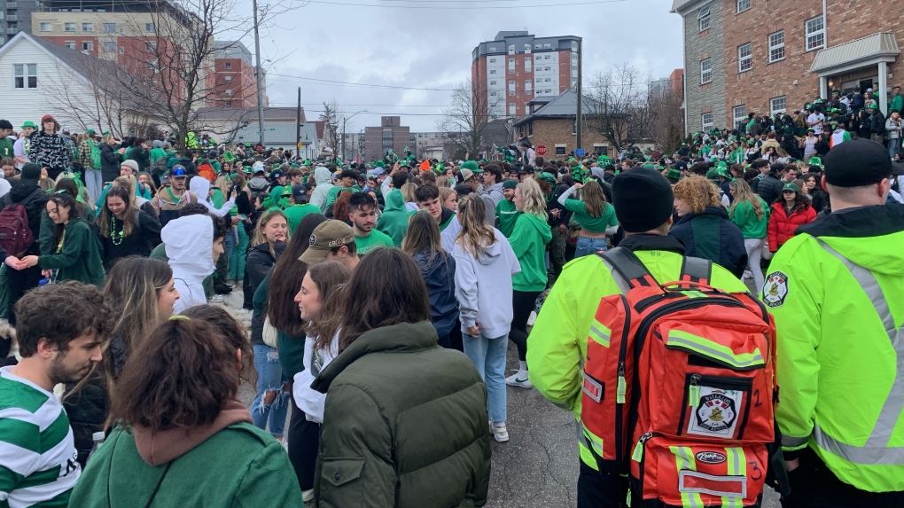 Thousands of St. Patrick's Day partiers spill into the street in Waterloo