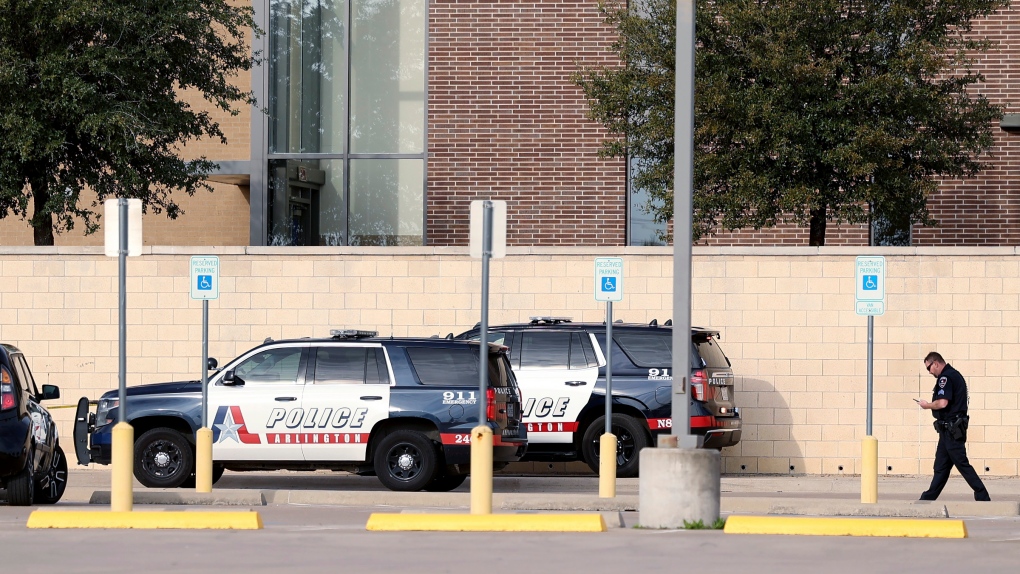 Arlington police investigate a shooting at Lamar High School in Arlington, Texas on Monday, March 20, 2023. (Amanda McCoy/Fort Worth Star-Telegram)