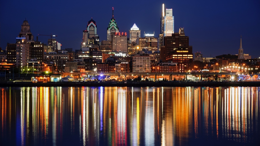 The Philadelphia skyline reflects on the Delaware River, Wednesday, March 16, 2022 ahead of the sunrise. (AP Photo/Matt Rourke) 