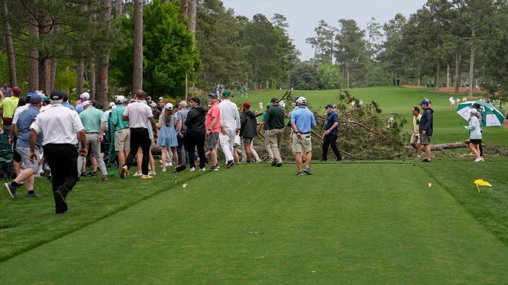 Masters resumes 2nd round after storms fell trees at Augusta