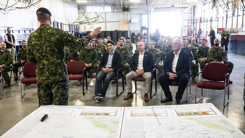 Alberta wildfires: Trudeau visits CAF base; conditions creating 'perfect storm' for fires