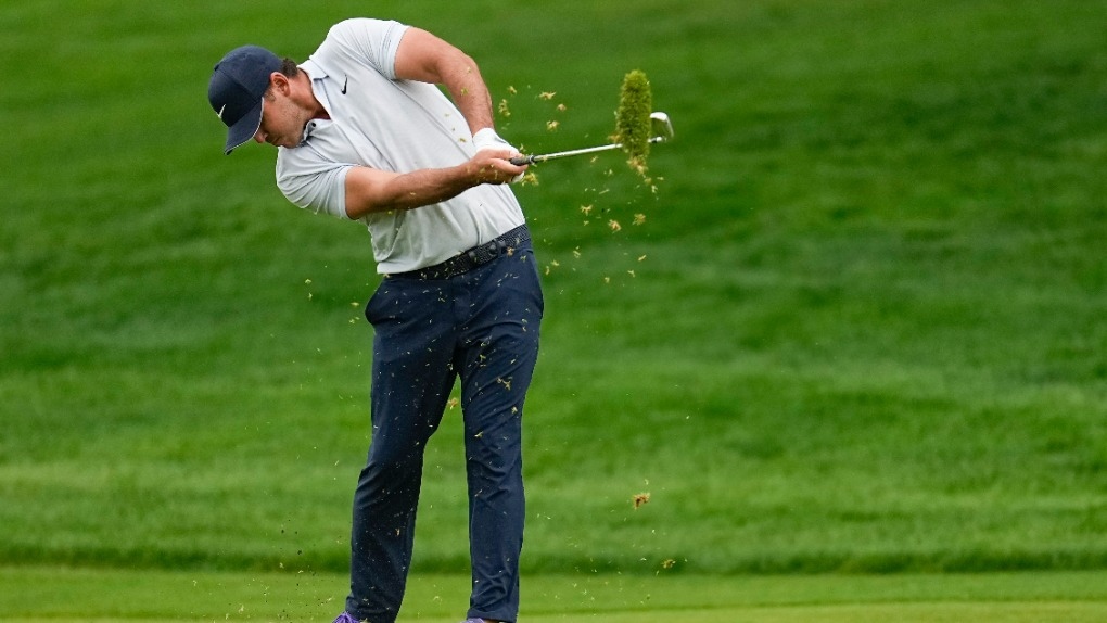 Koepka survives tough day to lead PGA Championship, Canadian Conners one shot back