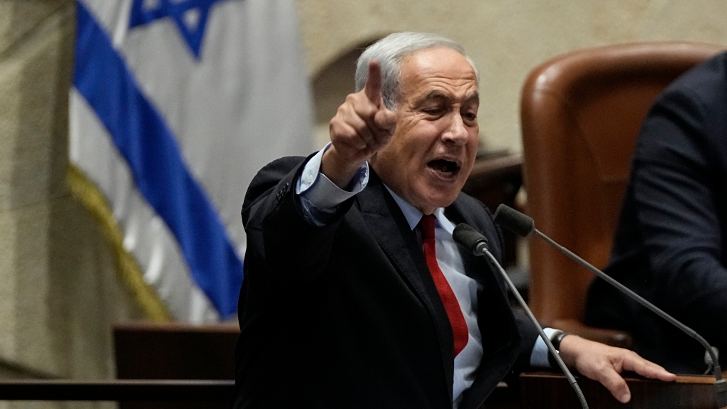 Israeli Prime Minister Benjamin Netanyahu delivers a statement in the Knesset, Israel's parliament in Jerusalem, Tuesday, May 23, 2023. (AP Photo/Ohad Zwigenberg)