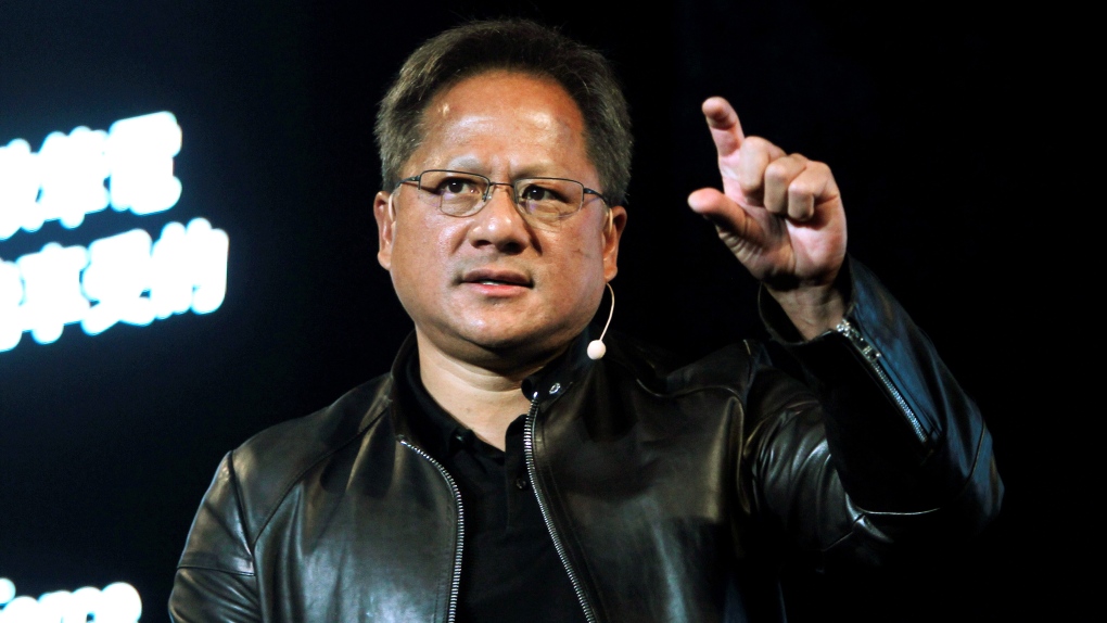 In this Tuesday, May 30, 2017, file photo, Nvidia CEO Jensen Huang delivers a speech about AI and gaming during the Computex Taipei exhibition at the world trade centre in Taipei, Taiwan. (AP Photo/Chiang Ying-ying, File)