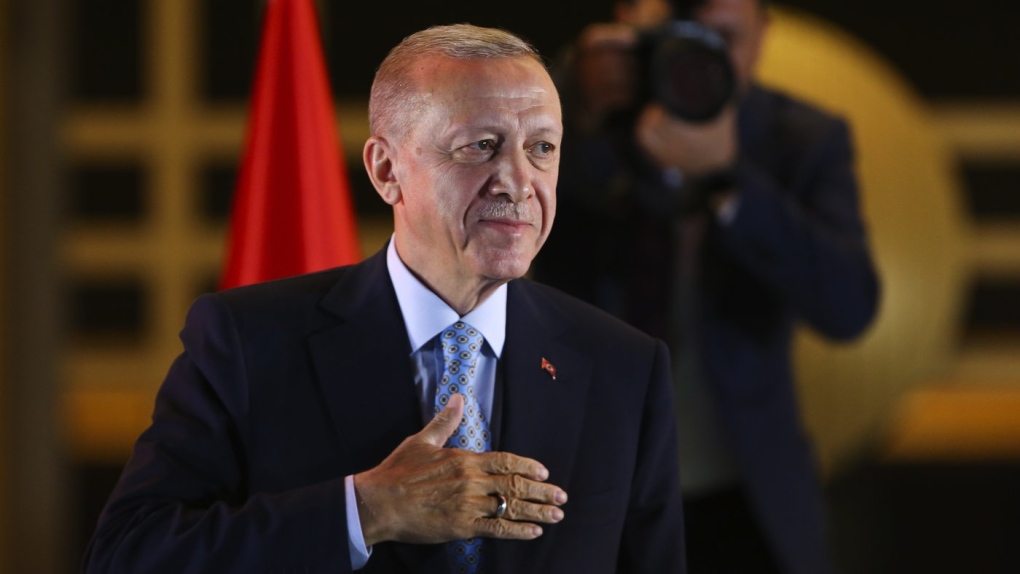 Turkish lira hits record low, stocks gain after Erdogan secures re-election