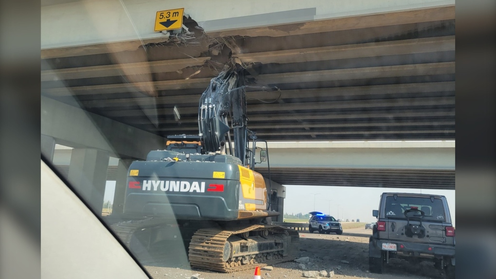 Part of Henday, Whitemud closed after truck hits overpass, causing 'extensive damage'