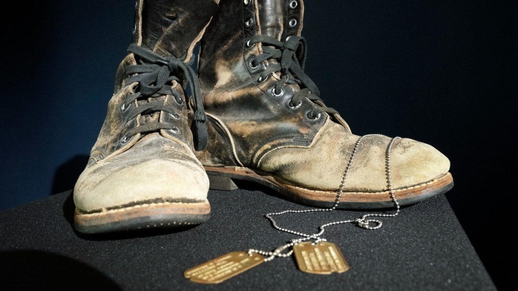 Boots and dog tags Alan Alda wore on ‘MASH’ sell at auction for US$125,000 that will go to charity