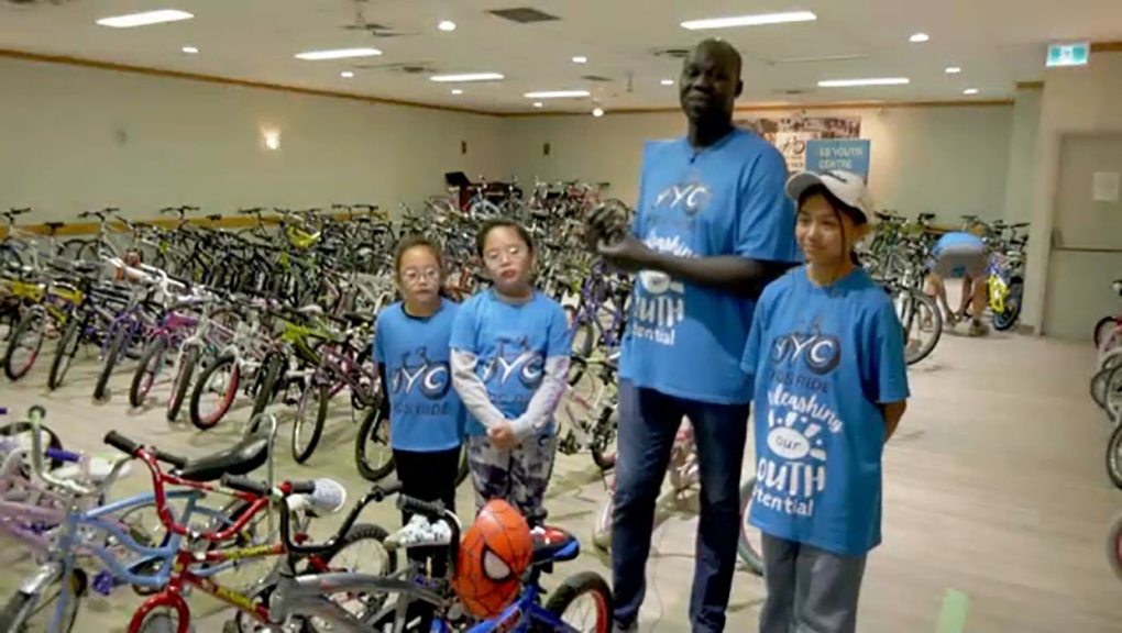 'You can see the hope': Hundreds of kids choose free bikes at Forest Lawn Community Centre