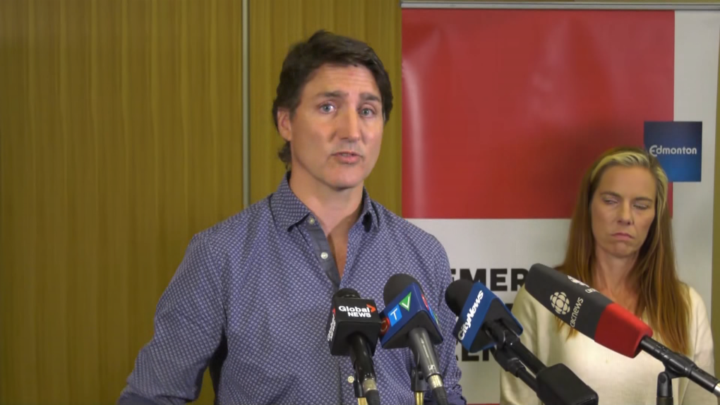 'Incredibly difficult times': PM Justin Trudeau visits N.W.T. wildfire evacuees at reception centre in Edmonton