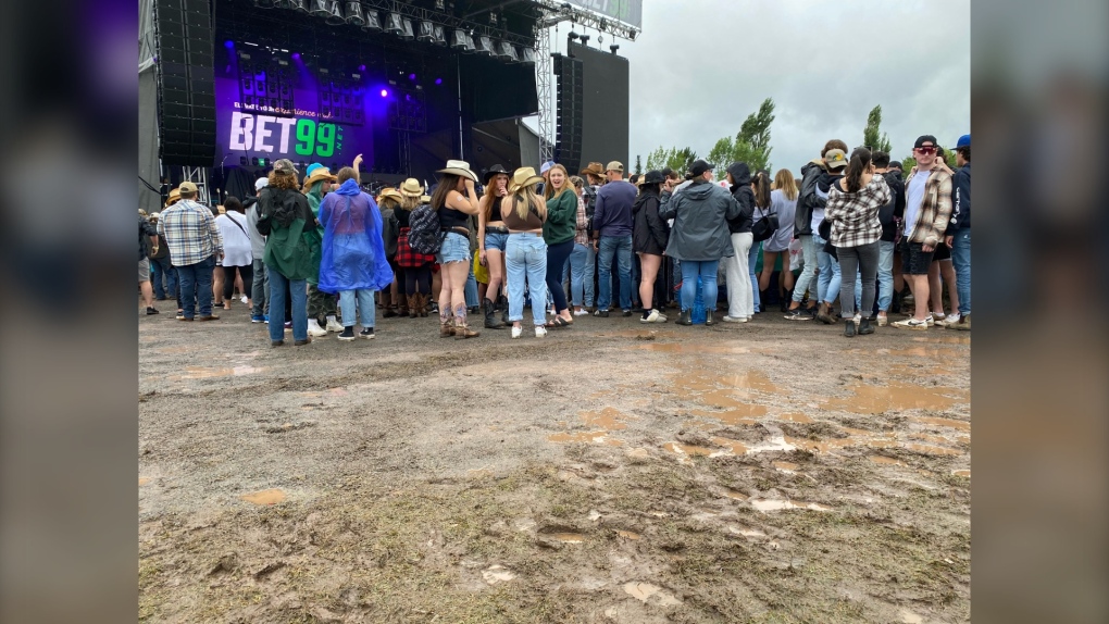 ‘It’s been great’: Country fans not bothered by rain or mud at YQM Festival