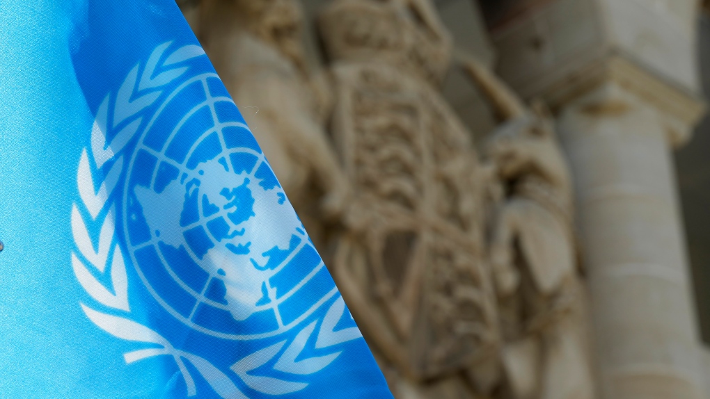 A U.N flag is seen on a U.N vehicle parked outside of the presidential palace in divided capital Nicosia, Cyprus, on Monday, Aug. 28, 2023. (AP Photo/Petros Karadjias)