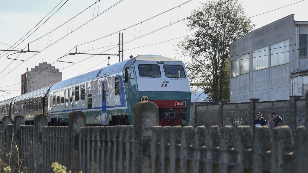 Speeding train slams into railway workers on tracks at Italian station, killing 5