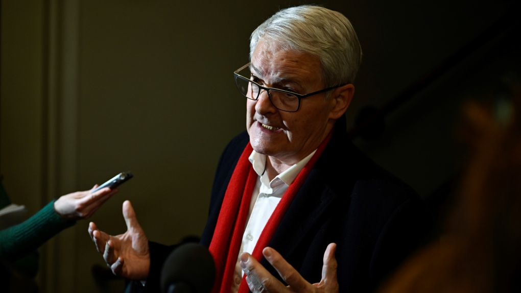 Marc Garneau speaks to reporters as he arrives for a caucus meeting on Parliament Hill in Ottawa, on Wednesday, March 8, 2023.  THE CANADIAN PRESS/Justin Tang