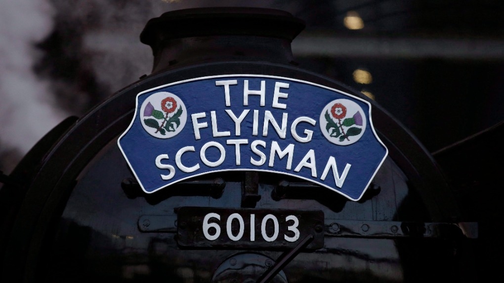 The Flying Scotsman's front name plate and its number are seen as the train prepares to leave Kings Cross railway station in London for its journey to York, Thursday, Feb. 25, 2016. THE CANADIAN PRESS/AP, Alastair Grant