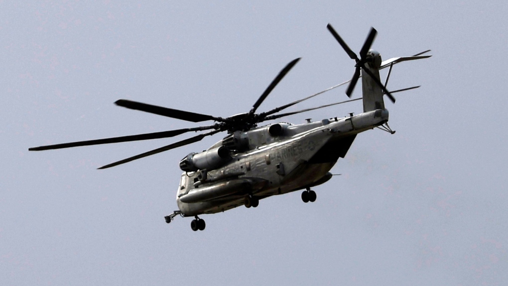 U.S. Marine Corps helicopter carrying 5 troops located