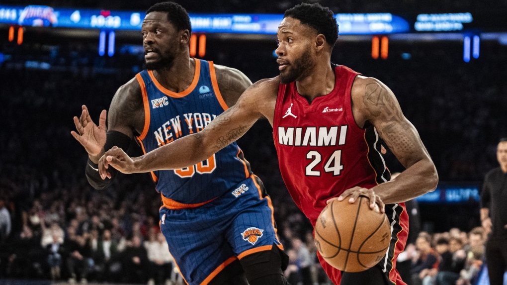 Miami Heat forward Haywood Highsmith (24) drives to the basket past New York Knicks forward Julius Randle, left, during the first half of an NBA basketball game on Saturday, Jan. 27, 2024, in New York. (AP Photo/Peter K. Afriyie)