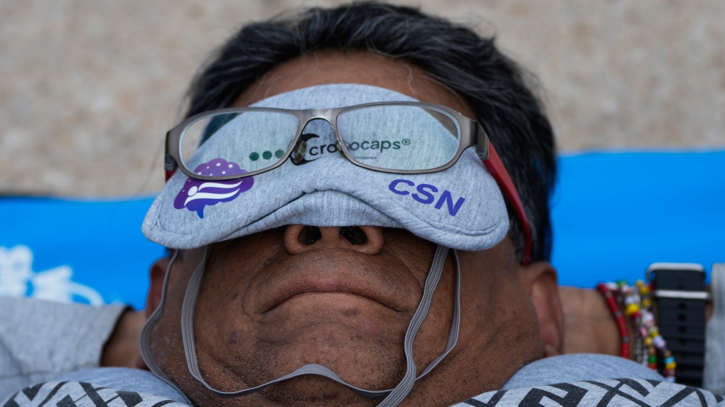 Hundreds of people in Mexico City stretch out for a 'mass nap' to commemorate World Sleep Day