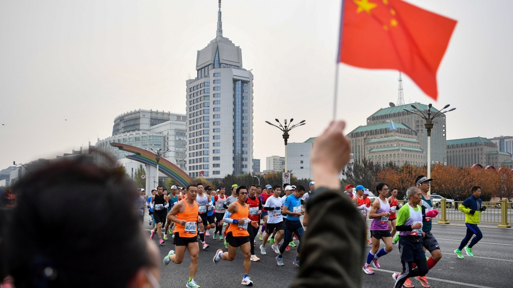 Beijing half-marathon under investigation after runners allegedly slow down to let Chinese athlete win
