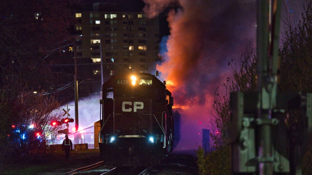 Video shows moment freight train catches fire and rolls through downtown London, Ont.