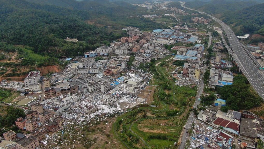 Aerial photos show wide devastation left by a deadly tornado in China's Guangzhou