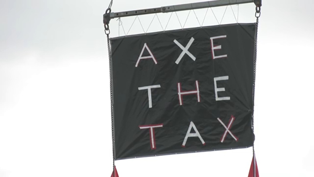 Anti-carbon tax protesters continue campaign west of Calgary