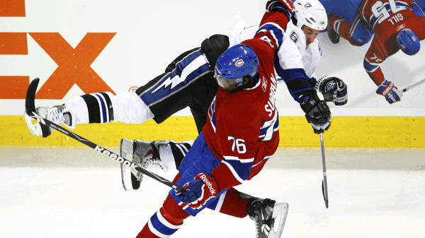 PK Subban knocks Ryan Malone flying at the Bell Centre (Oct. 13, 2010) THE CANADIAN PRESS/Paul Chiasson