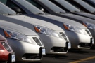 Unsold 2008 G6 sedans sit in a long row at a Pontiac dealership in Littleton, Colo., on Sunday, Jan. 27, 2008. General Motors Corp., the make of Pontiac, reported the largest annual loss for an automotive company Tuesday Feb. 12, 2008. (AP / David Zalubowski)