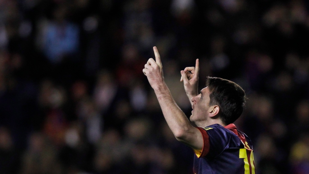 FC Barcelona's Lionel Messi celebrates with team