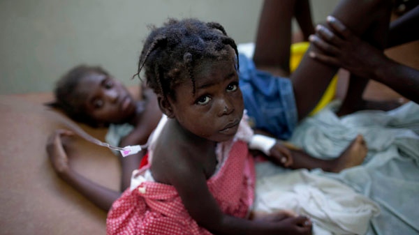 Children suffering cholera symptoms receive serum at a hospital in Marchand Dessalines, Haiti, Friday Oct. 22, 2010. (AP / Ramon Espinosa)