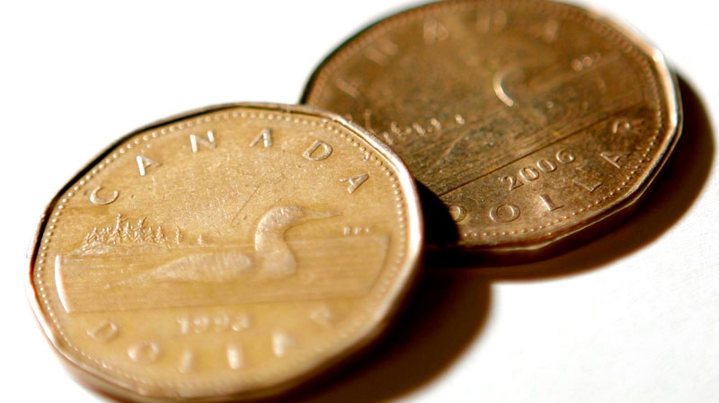 Canadian dollar coins, or Loonies, are shown in Ottawa on Friday Oct. 10, 2008. (Sean Kilpatrick / THE CANADIAN PRESS)