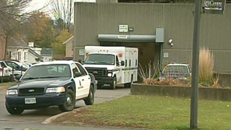 The vehicle carrying Sean Butler is seen outside the court house in Kitchener on Monday, Oct. 25, 2010.
