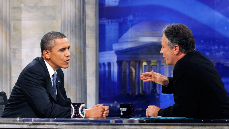 President Barack Obama is pictured during a commercial break as he talks with host Jon Stewart as he takes part in a taping of Comedy Central's The Daily Show with Jon Stewart, Wednesday, Oct. 27, 2010, in Washington. (AP / Charles Dharapak)