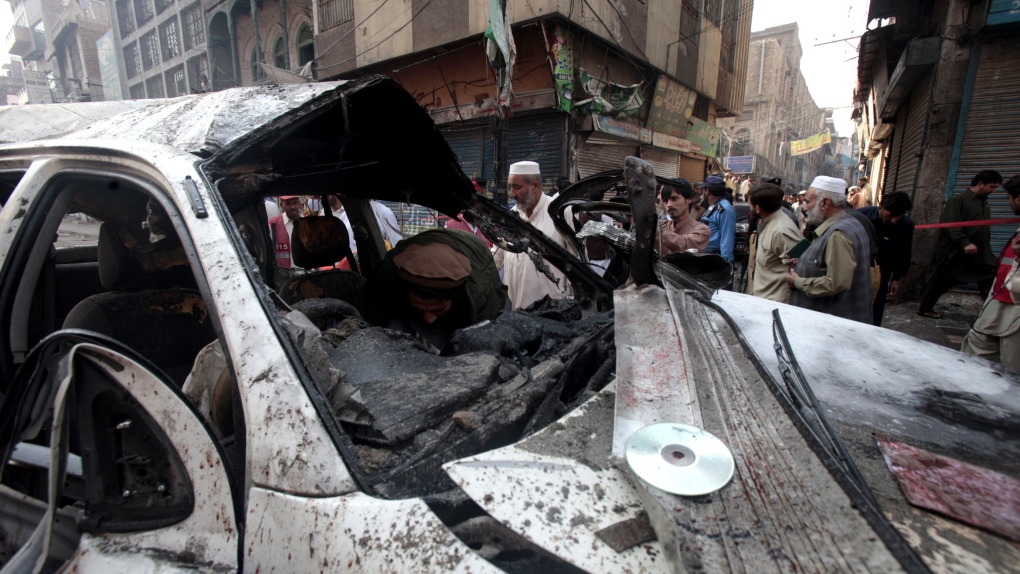 Bombing scene in Peshawar, Pakistan, Nov. 7, 2012.