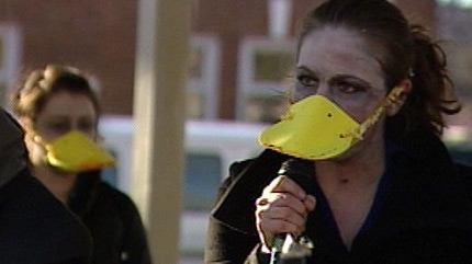 A woman dressed up as a zombie duck hopes a bit of embarrassment will shock the province into action.