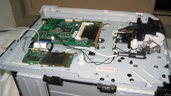 This undated photo released by the Dubai Police via the state Emirates News Agency (WAM) claims to show parts of a computer printer with explosives loaded into its toner cartridge found in a package onboard a cargo plane coming from Yemen, in Dubai, United Arab Emirates, on Saturday, Oct. 30, 2010. (AP / Dubai Police via Emirates News Agency)